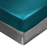 SiinvdaBZX satin mini crib sheets teal-grey folded, silky-soft sleep surface.
