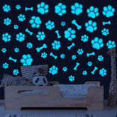 Sinekong glow dog paw print wall decal blue shows vivid daytime color and gentle night glow.