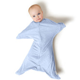 SleepingBaby Zipadee-Zip transition swaddle worn blue demonstrates snug sleep fit.