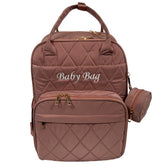 SLyTesha diaper backpack pink front view shows ample space for on-the-go baby care.