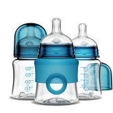Smilo baby bottle with Stage 0 nipple in aqua blue for gentle newborn feeds.