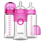 Smilo Stage 0 vent system on pink baby bottle for calmer feeds