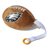 Smilo Philadelphia Eagles plush football pacifier holder closeup, soft cuddly design for baby comfort and team pride.