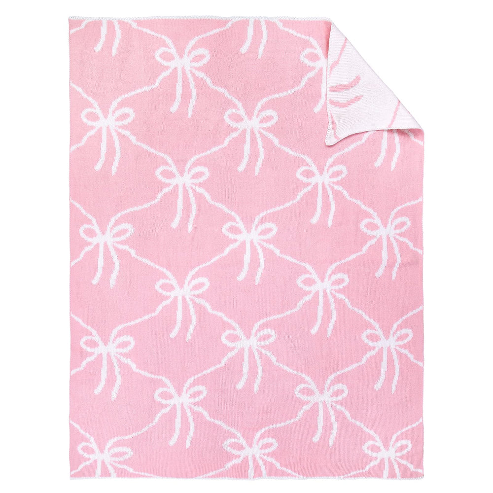 SmoothNovelty Pink Bow Knit Swaddle Blanket front view, cozy cotton comfort for year-round use