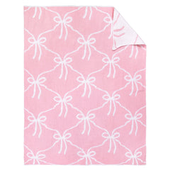 SmoothNovelty Pink Bow Knit Swaddle Blanket front view, cozy cotton comfort for year-round use