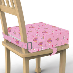SMZCTYI toddler booster seat on dining table boosts height for easier feeding during meals.