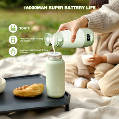 Snidomn portable bottle warmer in use during travel for quick feeding.
