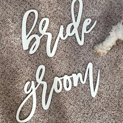 Snlioek wooden-chair-sign distressed finish adds vintage charm to reception