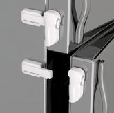 Snowharp latch with upgraded front and rear buttons for safer one-handed operation.
