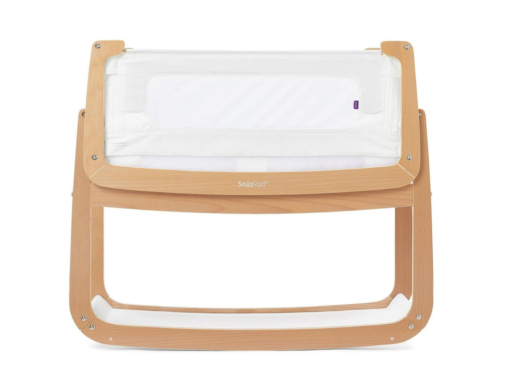 SnuzPod 4 rocking bassinet side view in natural finish for close-to-bed nighttime snuggles