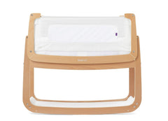 SnuzPod 4 rocking bassinet side view in natural finish for close-to-bed nighttime snuggles