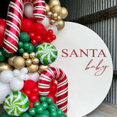 SOLUXIKA Santa Baby decal on wall creates a festive backdrop for holiday gatherings.