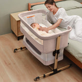 Soobaby bedside crib setup demonstrates easy attachment for safer co sleeping.