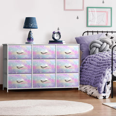 Sorbus Kids Dresser wood-top display area styled with lamp and books.