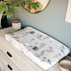 Sorrel + Fern Arctic Journey changing pad elastic stays secure for slip-free changes.