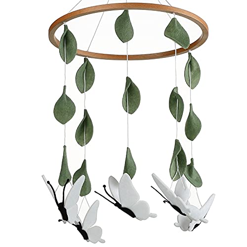 Sorrel + Fern baby crib mobile with wooden butterflies adds calming nursery decor