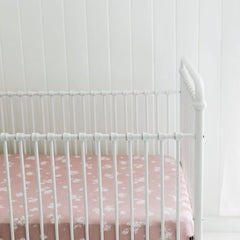 Sorrel + Fern antique rose sheets display fade-resistant color after washing.