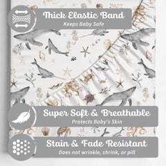 Sorrel + Fern crib sheets closeup emphasizes snug elastic and secure fit on standard mattresses