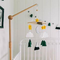 Sorrel + Fern Starry Woodland Night Mobile natural materials highlight eco-friendly felt and beech wood.