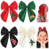 Soulchen Christmas bow with tree embroidery adds festive flair and secure wear