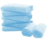 Spotted Play Aquamarine burp cloths in flat lay show ultra-absorbent baby care.