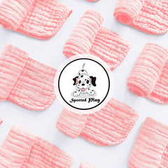 Spotted Play baby burp cloths soft cotton—gentle against sensitive skin during feeds.