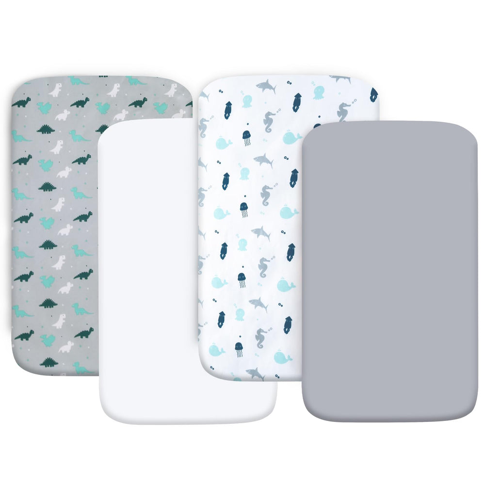 SPRINGSPIRIT grey dinosaurs crib sheets closeup showing ultra-soft feel