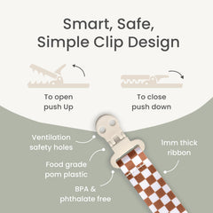 Stadela Anabella durable plastic clasp secures pacifier without snagging clothes.