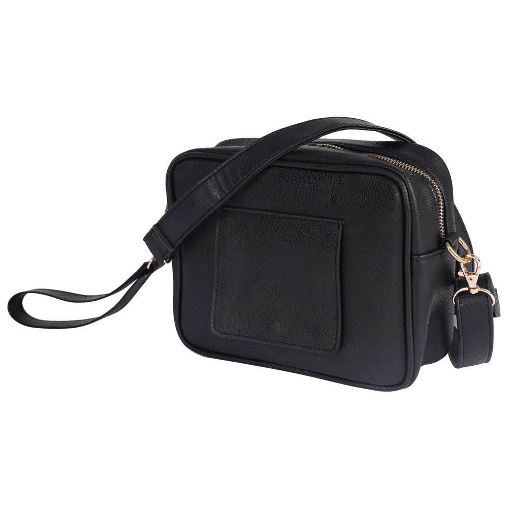 STAËLL crossbody diaper bag with wipes dispenser keeps wipes handy on the go