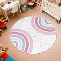 STARUIA Pink Round Rug rainbow-pattern highlights color learning and imaginative play in kids' rooms.