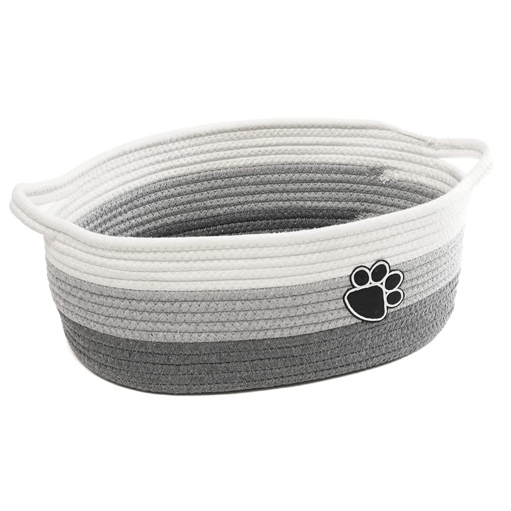 STOBS K small woven basket with handle keeps clutter organized on shelves.