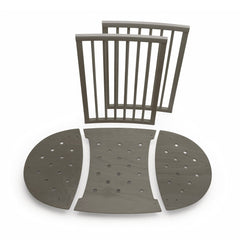 Stokke Sleepi Bed Extension V2 hazy grey packaging shows included parts for easy upgrade