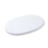 Stokke Sleepi Mini fitted sheet Grey Dotty folded, premium organic cotton for gentle baby comfort.