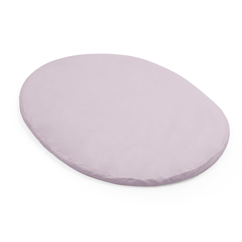Stokke Sleepi Mini fitted sheet V3 Lavender on mattress offers soft cotton percale comfort for newborns.