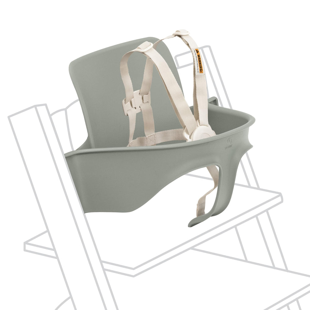 Stokke Tripp Trapp Baby Set 2 on Glacier Green chair for comfortable mealtime seating.