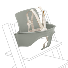 Stokke Tripp Trapp Baby Set 2 on Glacier Green chair for comfortable mealtime seating.