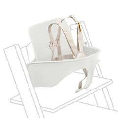 Stokke Tripp Trapp Baby Set 2 white attached to chair for stable high chair seating.