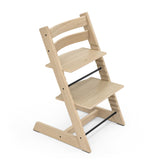 Stokke Tripp Trapp oak natural, forward view at table for inclusive family meals.