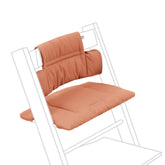 Stokke Tripp Trapp Classic Cushion 2 Terracotta close-up fabric offers baby comfort.