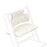 Stokke Tripp Trapp Cushion 2 Wheat Cream sits on chair for cozy meals