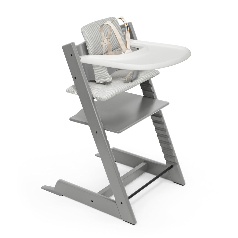 Stokke Tripp Trapp chair in storm grey ready for family dining
