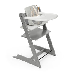 Stokke Tripp Trapp chair in storm grey ready for family dining