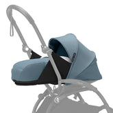 Stokke YOYO 0+ Aqua mattress offers soft newborn comfort for flat recline.