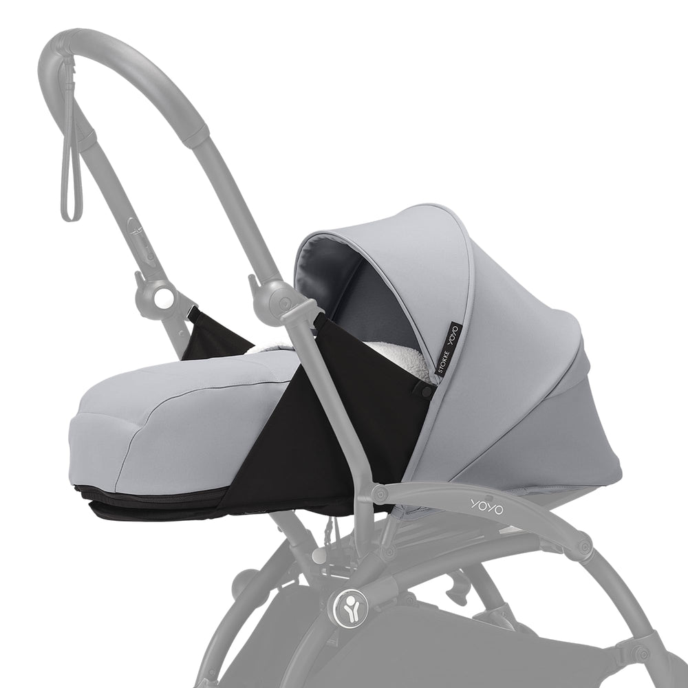 Stokke YOYO 0+ Newborn Pack Stone initial setup demonstrates travel-ready portability for newborn outings