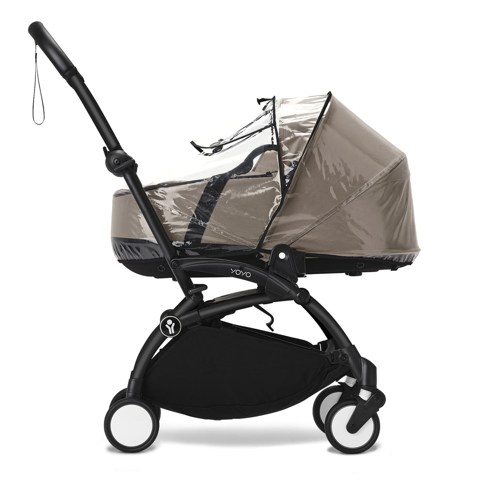 Stokke YOYO rain cover on newborn shell front view for weather protection