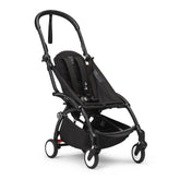 Stokke YOYO3 frame black close-up handle with soft grip for comfortable maneuvering.
