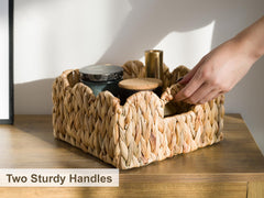 StorageWorks wicker basket with built-in handles demonstrates secure carrying and easy retrieval.