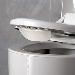 Storchenbeck urine deflector front view demonstrates universal fit for various toilets.