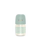 Suavinex Bonhomia glass bottle 4oz mint in hand, ideal newborn feeding option.