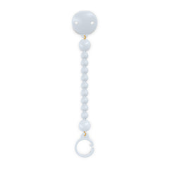Suavinex Color Essence pacifier clip clips on clothes for easy access and cleanliness.
